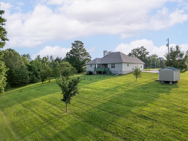 3337 Tarsus Rd, Palmyra, TN 37142 - view of green lawn with a storage unit