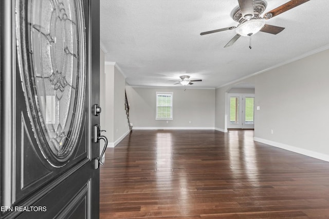 122 Springfield Ln, Jacksboro, TN 37757 - entryway featuring a ceiling fan, crown molding, dark wood-style floors, a textured ceiling, and arched walkways