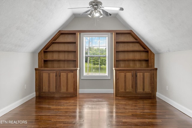 122 Springfield Ln, Jacksboro, TN 37757 - bonus room featuring a textured ceiling, vaulted ceiling, ceiling fan, dark wood-style floors, and baseboards