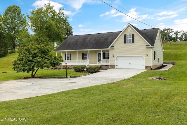 122 Springfield Ln, Jacksboro, TN 37757 - view of front of home with a porch, concrete driveway, a garage, and a front yard