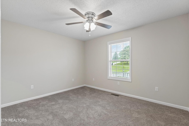 122 Springfield Ln, Jacksboro, TN 37757 - carpeted spare room with baseboards, ceiling fan, and a textured ceiling