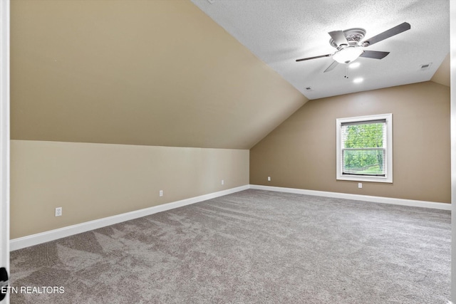 122 Springfield Ln, Jacksboro, TN 37757 - bonus room featuring lofted ceiling, ceiling fan, carpet flooring, a textured ceiling, and baseboards