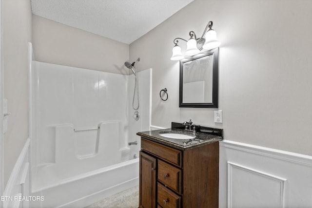 122 Springfield Ln, Jacksboro, TN 37757 - bathroom with vanity, shower / bath combination, and a textured ceiling