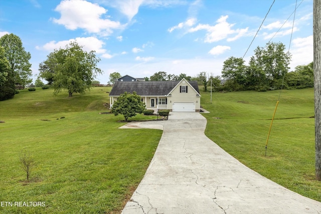 122 Springfield Ln, Jacksboro, TN 37757 - view of front of house with concrete driveway, a front yard, and an attached garage