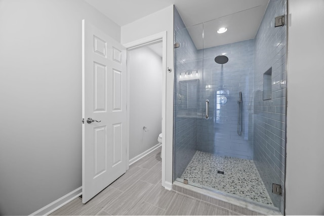 1183 Buckingham Cir, Franklin, TN 37064 - full bathroom featuring baseboards, toilet, a shower stall, and recessed lighting
