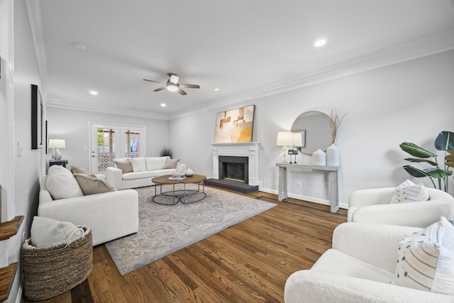 1183 Buckingham Cir, Franklin, TN 37064 - living area featuring wood finished floors, a ceiling fan, recessed lighting, ornamental molding, and a brick fireplace