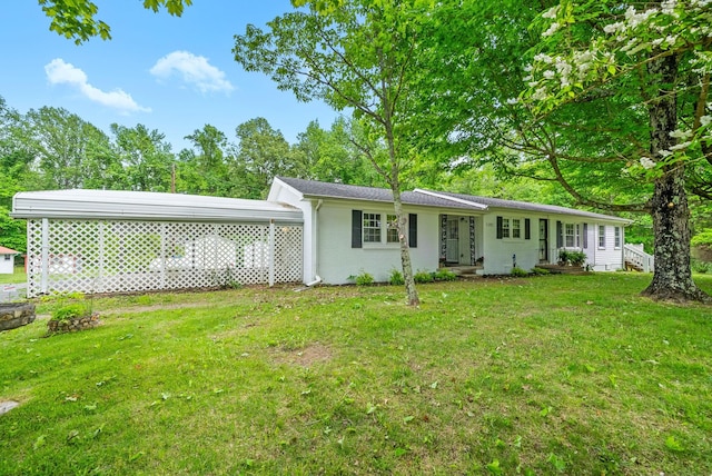 ranch-style house featuring a front lawn