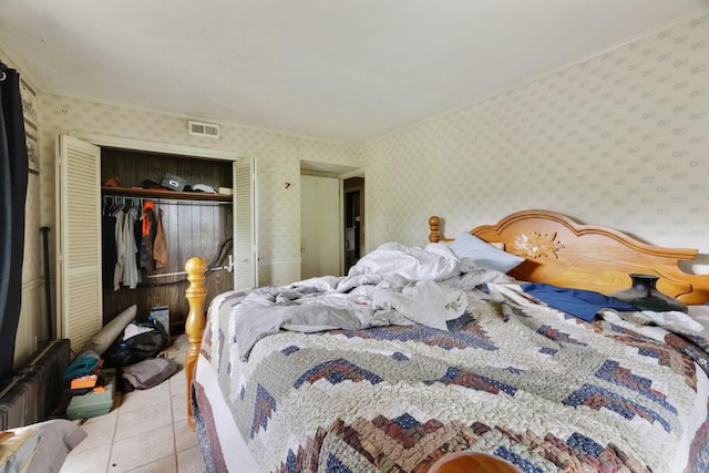 1023 Pine Valley Rd, Kingston Springs, TN 37082 - bedroom featuring a closet, tile patterned floors, and wallpapered walls