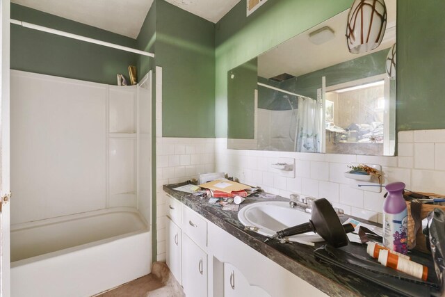 1023 Pine Valley Rd, Kingston Springs, TN 37082 - bathroom with tile walls, shower / bath combination with curtain, and vanity