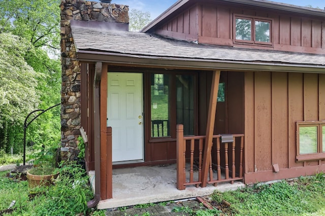 1023 Pine Valley Rd, Kingston Springs, TN 37082 - doorway to property with board and batten siding, roof with shingles, and a chimney