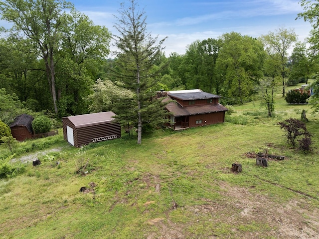 1023 Pine Valley Rd, Kingston Springs, TN 37082 - view of yard featuring an outbuilding and a view of trees