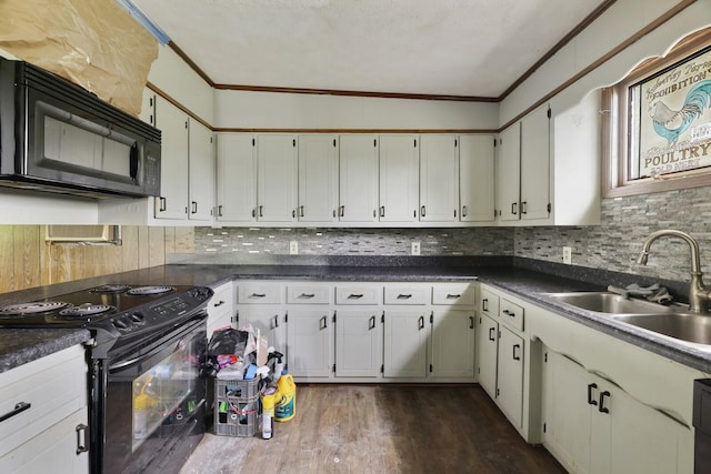 1023 Pine Valley Rd, Kingston Springs, TN 37082 - kitchen with black appliances, a sink, crown molding, dark wood finished floors, and dark countertops
