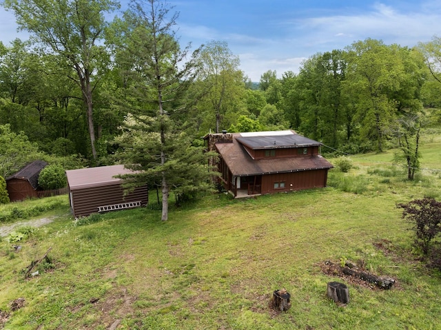 1023 Pine Valley Rd, Kingston Springs, TN 37082 - view of green lawn with a forest view and an outbuilding