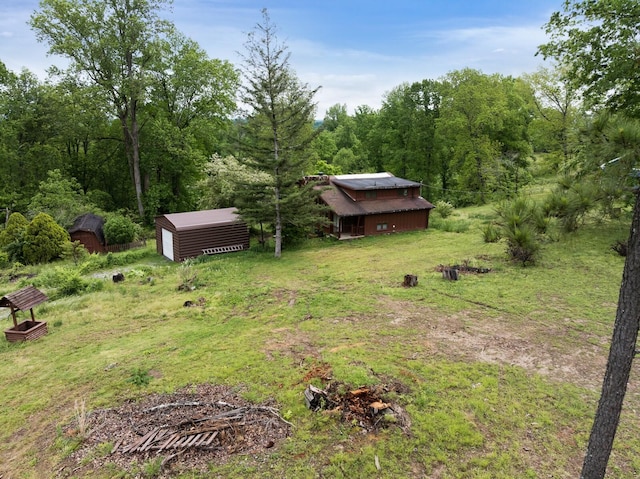 1023 Pine Valley Rd, Kingston Springs, TN 37082 - view of yard with an outdoor structure, a view of trees, and a shed