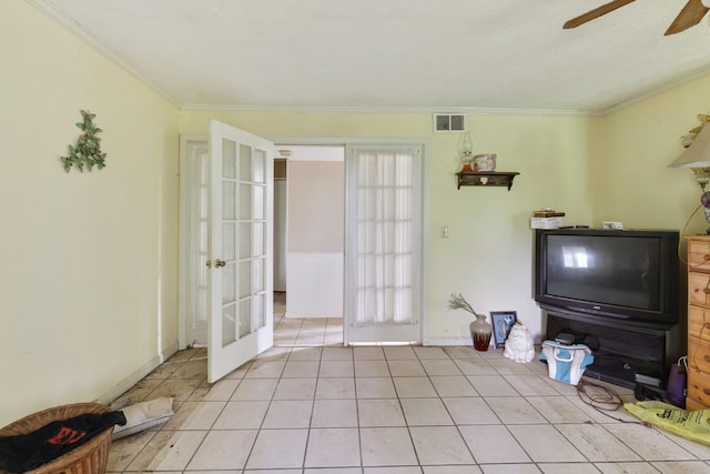 1023 Pine Valley Rd, Kingston Springs, TN 37082 - living area featuring french doors, a ceiling fan, ornamental molding, light tile patterned floors, and baseboards