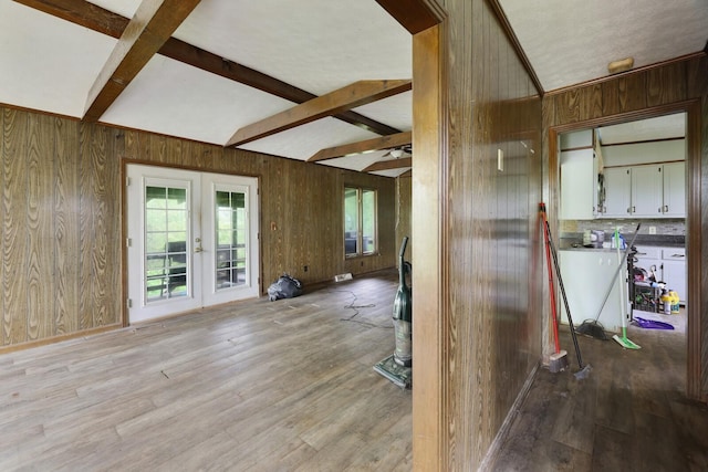 1023 Pine Valley Rd, Kingston Springs, TN 37082 - empty room with wooden walls, french doors, and light wood finished floors
