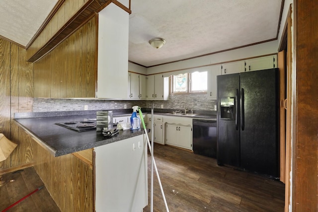 1023 Pine Valley Rd, Kingston Springs, TN 37082 - kitchen featuring black appliances, a sink, a textured ceiling, a peninsula, and dark countertops