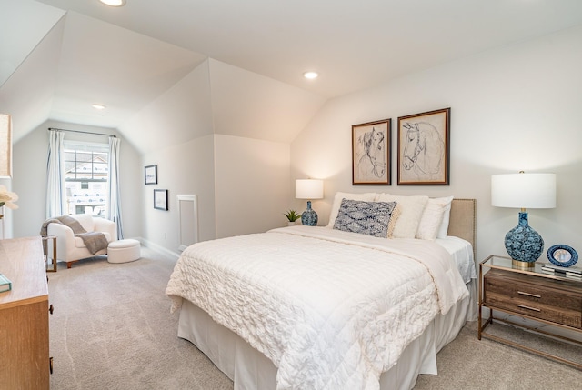 bedroom featuring light carpet, lofted ceiling, baseboards, and recessed lighting