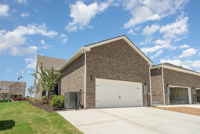 view of property exterior with cooling unit, brick siding, and driveway