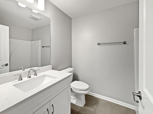 6332 York Dr, Hermitage, TN 37076 - bathroom with tile patterned floors, toilet, vanity, a shower, and baseboards