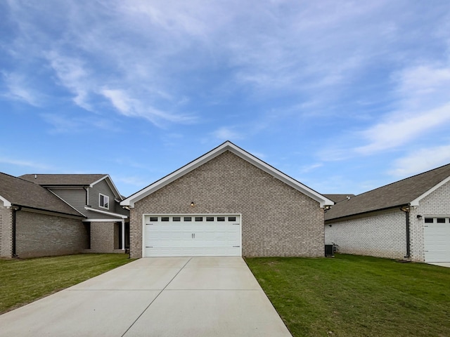 6332 York Dr, Hermitage, TN 37076 - view of front of house featuring brick siding, a front lawn, and a garage