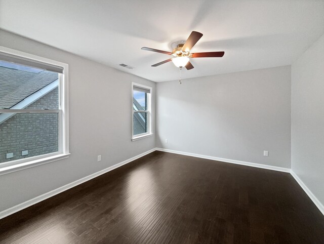 6332 York Dr, Hermitage, TN 37076 - spare room featuring dark wood finished floors, ceiling fan, and baseboards