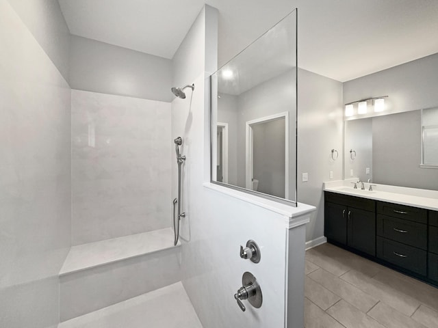 6332 York Dr, Hermitage, TN 37076 - bathroom with a tile shower, tile patterned floors, and vanity