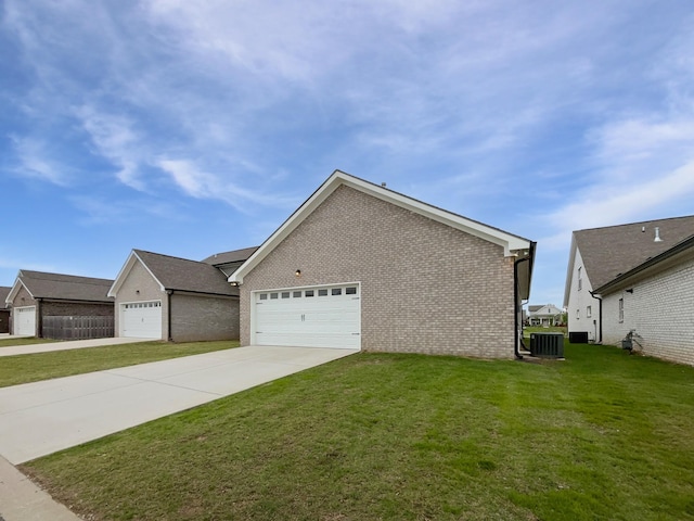 6332 York Dr, Hermitage, TN 37076 - view of property exterior with brick siding, a yard, concrete driveway, and cooling unit
