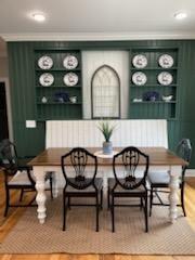 bar featuring built in features, ornamental molding, light wood finished floors, and recessed lighting