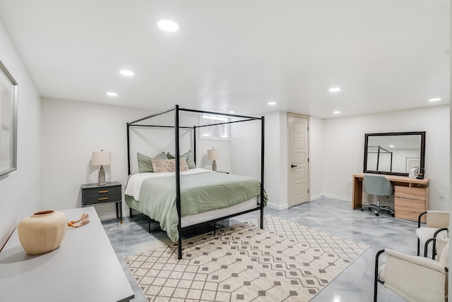 bedroom with finished concrete flooring, an office area, recessed lighting, and baseboards