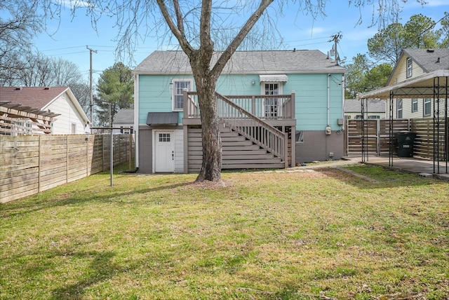 back of house featuring stairs, a wooden deck, a shed, and an outdoor structure