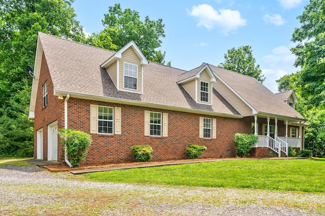 5643 Bethlehem Rd, Springfield, TN 37172 - new england style home with a garage, brick siding, a shingled roof, a front lawn, and a porch