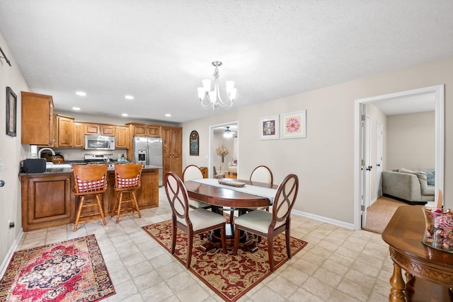 5643 Bethlehem Rd, Springfield, TN 37172 - dining space with a chandelier, recessed lighting, and baseboards