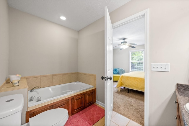 5643 Bethlehem Rd, Springfield, TN 37172 - bathroom with toilet, a jetted tub, ensuite bathroom, tile patterned floors, and a ceiling fan