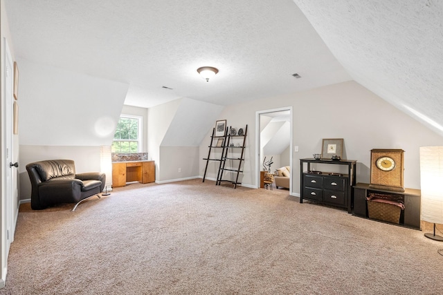 5643 Bethlehem Rd, Springfield, TN 37172 - sitting room featuring carpet, vaulted ceiling, a textured ceiling, and baseboards