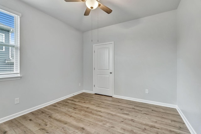 1044 Alta Vista Ln, Smyrna, TN 37167 - spare room featuring wood finished floors, a ceiling fan, and baseboards