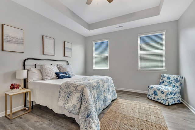 1044 Alta Vista Ln, Smyrna, TN 37167 - bedroom with baseboards, a raised ceiling, wood finished floors, and a ceiling fan