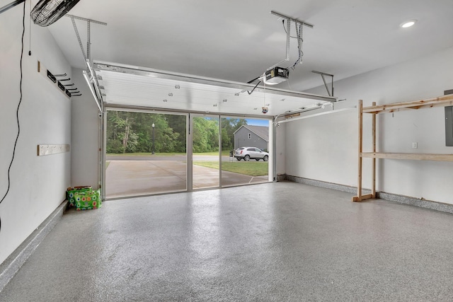 1044 Alta Vista Ln, Smyrna, TN 37167 - garage with a garage door opener, electric panel, and baseboards