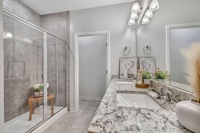 1044 Alta Vista Ln, Smyrna, TN 37167 - full bathroom with a shower stall, a chandelier, double vanity, tile patterned flooring, and baseboards