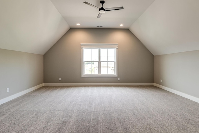 bonus room with a ceiling fan, lofted ceiling, carpet floors, baseboards, and recessed lighting
