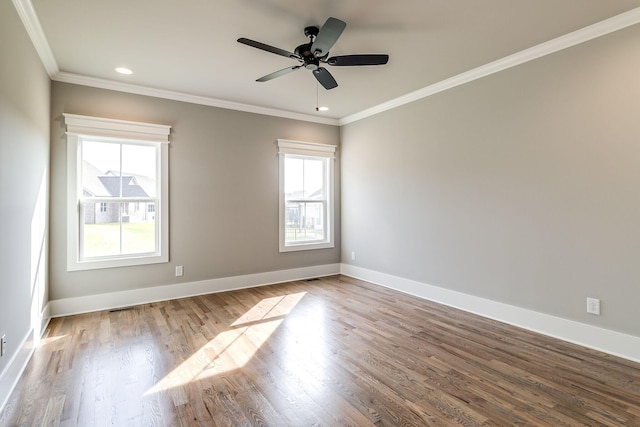 unfurnished room featuring ornamental molding, wood finished floors, a ceiling fan, baseboards, and recessed lighting