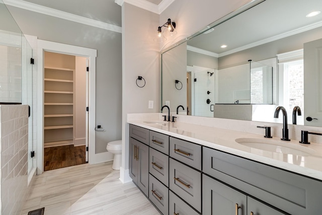 full bathroom with a shower stall, ornamental molding, a spacious closet, double vanity, and recessed lighting