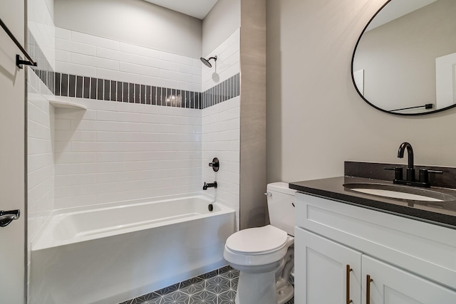 bathroom featuring toilet,  shower combination, and vanity