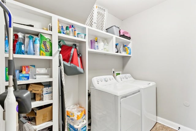 1384 Round Hill Ln, Spring Hill, TN 37174 - laundry area with washer and clothes dryer and baseboards