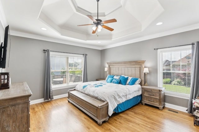 1384 Round Hill Ln, Spring Hill, TN 37174 - bedroom with light wood-style floors, a tray ceiling, baseboards, crown molding, and ceiling fan