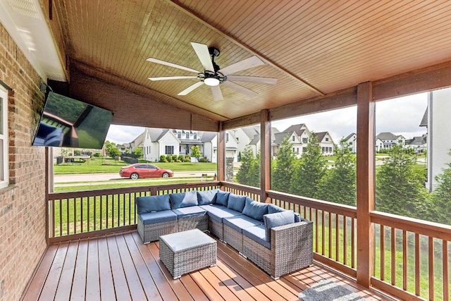1384 Round Hill Ln, Spring Hill, TN 37174 - wooden terrace with a residential view, a ceiling fan, an outdoor living space, and a lawn