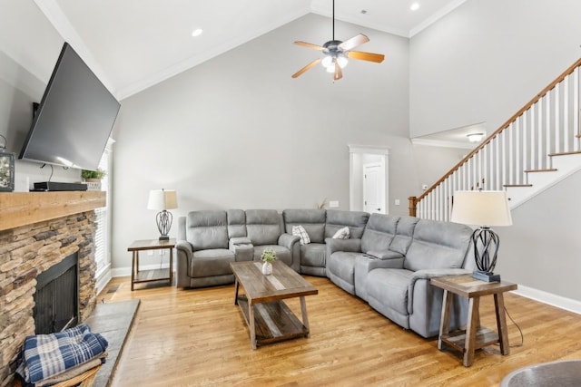 1384 Round Hill Ln, Spring Hill, TN 37174 - living area featuring ceiling fan, light wood finished floors, stairs, baseboards, and ornamental molding