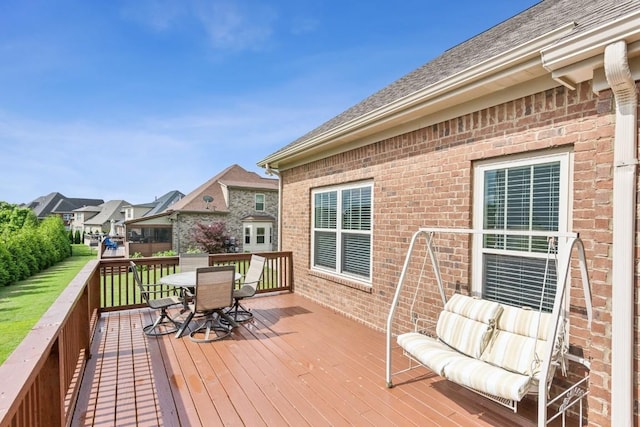 1384 Round Hill Ln, Spring Hill, TN 37174 - wooden deck with outdoor dining area and a residential view