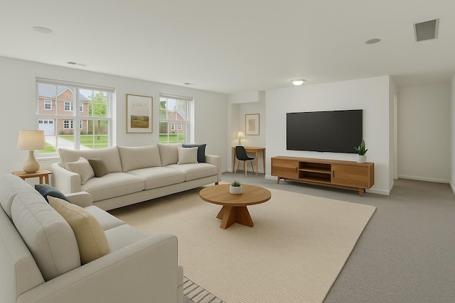 living room with light colored carpet and baseboards