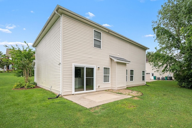 1000 Beverly Ln, Spring Hill, TN 37174 - rear view of house with a lawn and a patio area